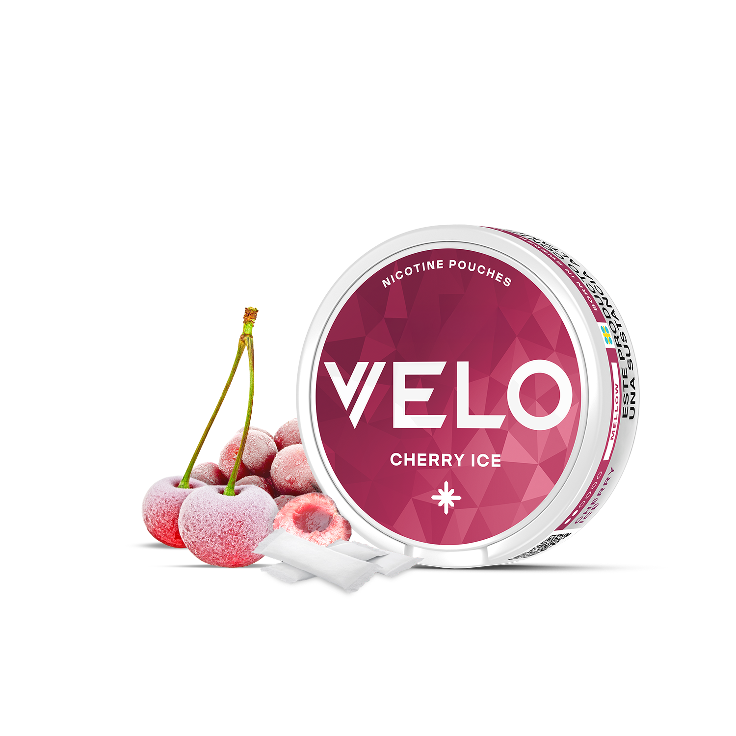 Se muestra un envase abierto de VELO Cherry Ice, con dos bolsitas blancas a su lado sobre una superficie blanca, destacando una irresistible experiencia de nicotina de cereza helada.